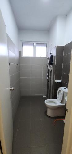 Ένα μπάνιο στο Homestay Desaru Balau