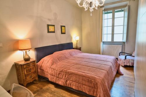 Postel nebo postele na pokoji v ubytování Corte Dei Portici