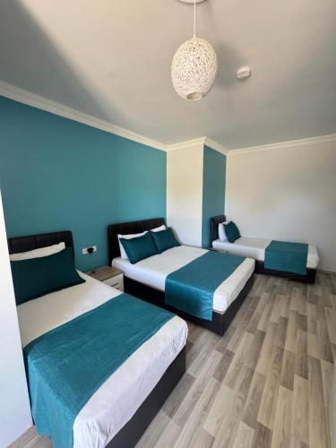 Katil atau katil-katil dalam bilik di Geyikli Berfin Otel