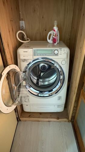a washer and dryer in a small room at WAVILLA mihata cho in Yamagata