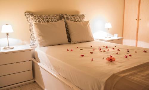 Ένα ή περισσότερα κρεβάτια σε δωμάτιο στο Alexander Seaside