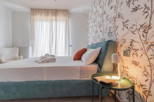 Ένα ή περισσότερα κρεβάτια σε δωμάτιο στο Appartamento Viserba MareVerde Relax e Comodità