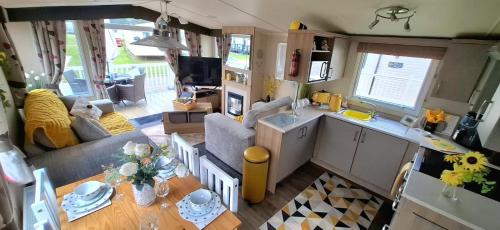 an aerial view of a living room and kitchen of an rv at The Humble Bee in Cleethorpes