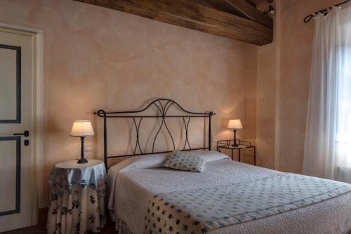 Postel nebo postele na pokoji v ubytování Il Borghetto Tuscan Holidays