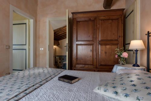 Postel nebo postele na pokoji v ubytování Il Borghetto Tuscan Holidays
