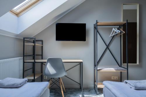 Una cama o camas en una habitación de Hotel Albatros Wąsosz