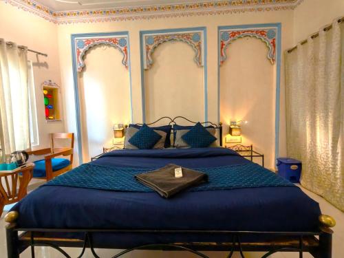 Katil atau katil-katil dalam bilik di Shalom Backpackers Udaipur