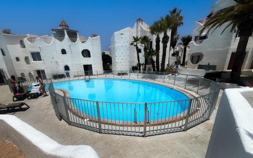 Πισίνα στο ή κοντά στο Triplex Bungalow Las Tortugas 109