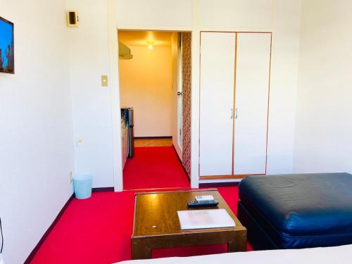 Ruang duduk di Sakura 305, near Itami Airport Long-term stays possible Japanese scenery, Sakura Apartment