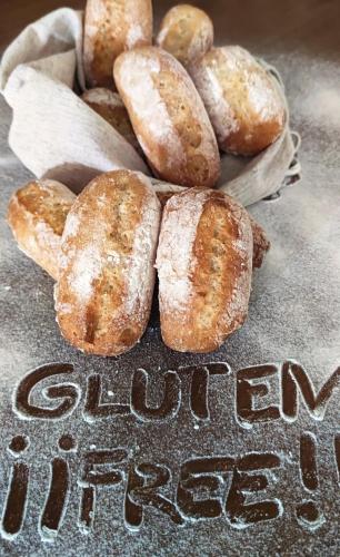 a group of donuts sitting on top of a sign at Hostal y Apartamento Rural Los Naranjos in Melegis