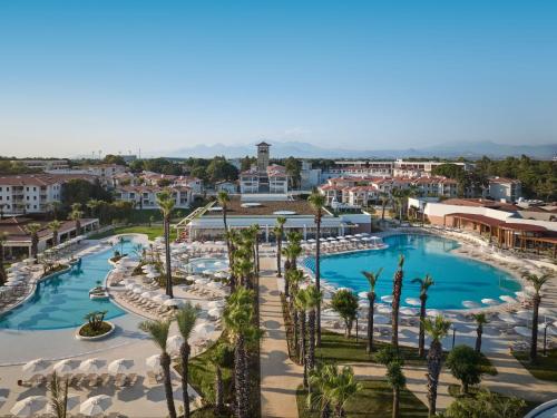 an aerial view of a resort with a pool at Paloma Grida in Belek