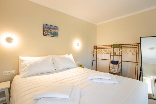 Postel nebo postele na pokoji v ubytování Sunrise apartments