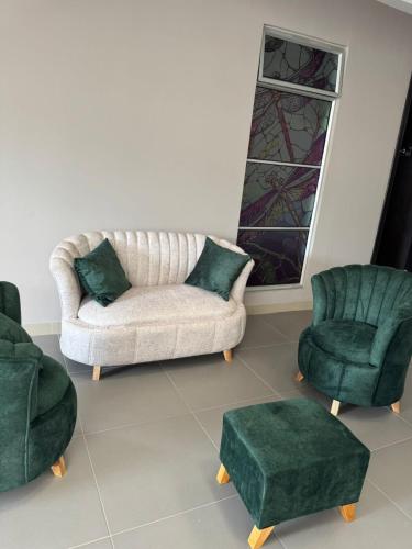 Zona de estar de Hotel San Miguel src
