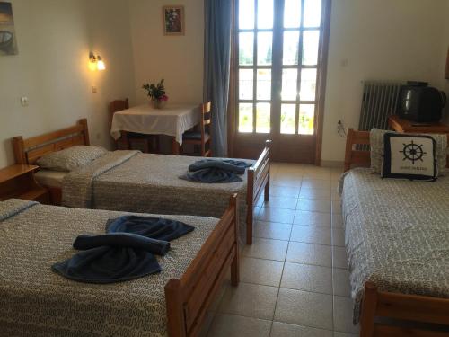 Posteľ alebo postele v izbe v ubytovaní Christina Apartments