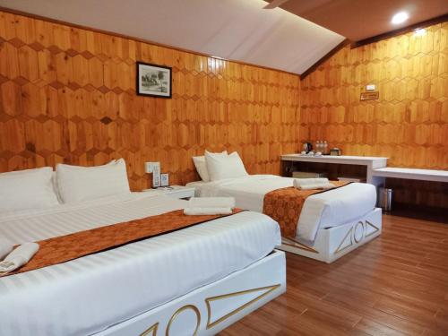 Postel nebo postele na pokoji v ubytování Nov Koh Kong Resort