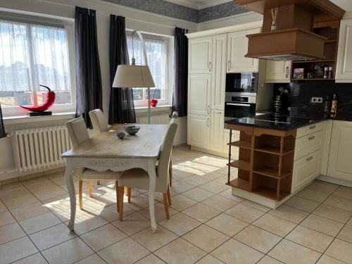 Kuchyň nebo kuchyňský kout v ubytování Monteurwohnung am Heideresort Brüggen