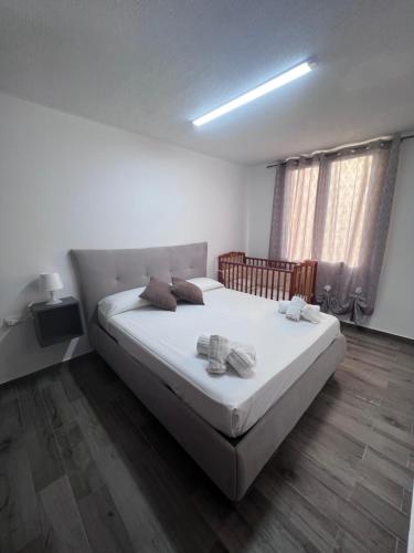 Postel nebo postele na pokoji v ubytování Tonzuso Holyday House