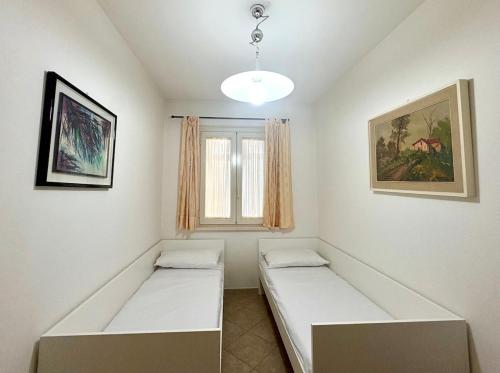 Katil atau katil-katil dalam bilik di The Green Nest-Casa con giardino