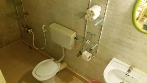 Ένα μπάνιο στο Johny's Beach House Kovalam