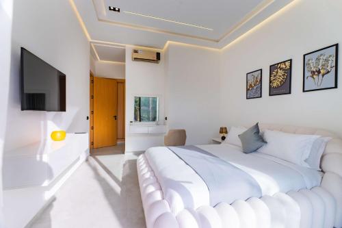Una cama o camas en una habitación de Villa Zahi