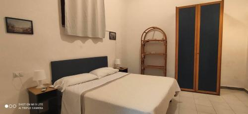 Ένα ή περισσότερα κρεβάτια σε δωμάτιο στο cami sea apartment
