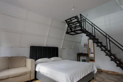 Postel nebo postele na pokoji v ubytování Nimo Resort Ciater