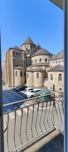 a view of a building from a balcony at logement familial spacieux, 2 chambres , grand salon in Fougères