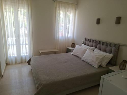Ένα ή περισσότερα κρεβάτια σε δωμάτιο στο Villa Sylvia 1