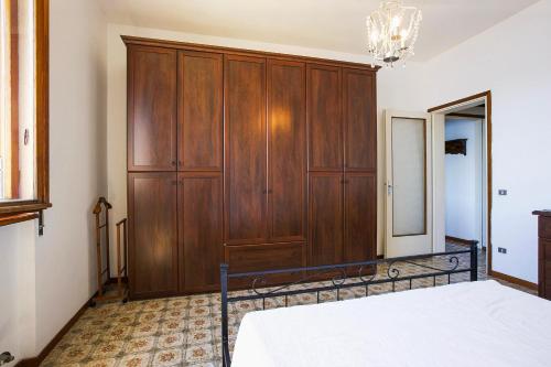 Ένα ή περισσότερα κρεβάτια σε δωμάτιο στο Casa Baita Flavia