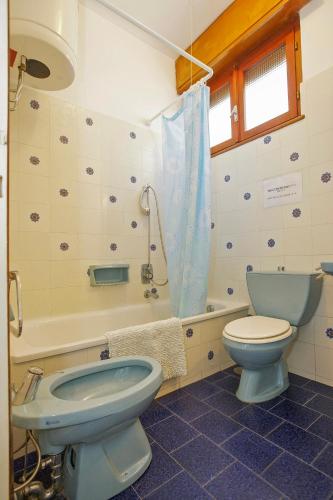 Ένα μπάνιο στο Casa Baita Flavia