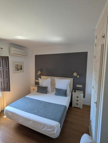 Katil atau katil-katil dalam bilik di Hostal Tabanqueta