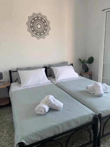 Letto o letti in una camera di Sofia's Bella Vista Pagoi