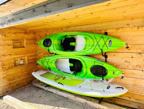 two kayaks are sitting in a sauna at Lakeview House by Leavetown Vacations in Lakefield