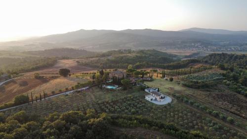 an aerial view of a estate in the hills at Agriturismo Palazzo Val Del Sasso in Villastrada