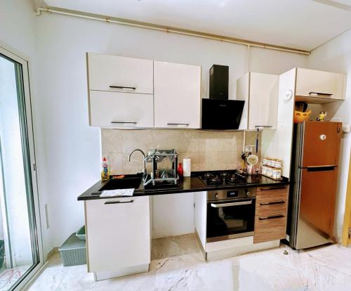 Kuchyň nebo kuchyňský kout v ubytování Dar Julia