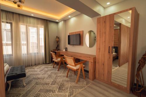 Телевизор и/или развлекательный центр в Galata Greenland Hotel