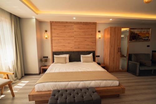 Кровать или кровати в номере Galata Greenland Hotel