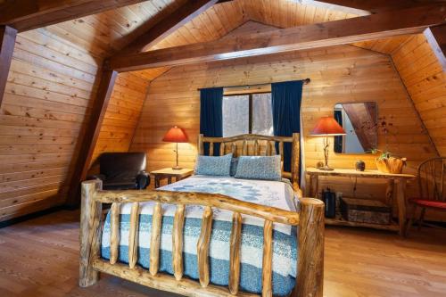 Ένα ή περισσότερα κρεβάτια σε δωμάτιο στο Sweetin Summit Retreat