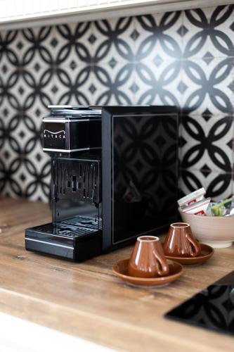 a microwave sitting on top of a kitchen counter at Holiday Home Virida, app Leopold III in Ivančna Gorica