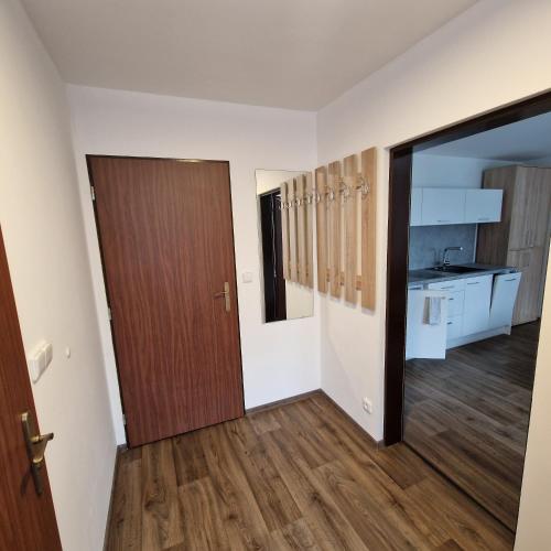 Apartmány RADOSTにあるベッド