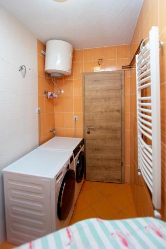 Postel nebo postele na pokoji v ubytování Villa Sandra