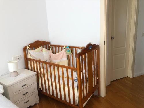 En eller flere senge i et værelse på Apartamento muy acogedor , en el casco antiguo.