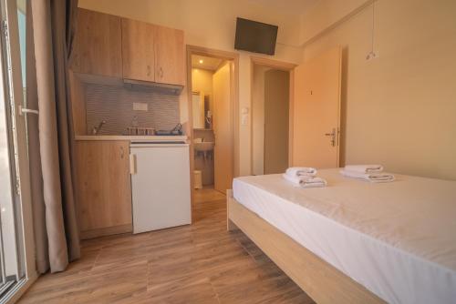 Vavatzanos Roomsにあるベッド