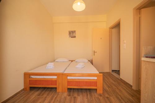 Vavatzanos Roomsにあるベッド