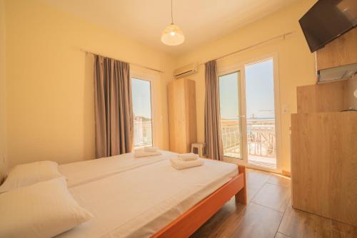 Vavatzanos Roomsにあるベッド