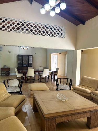 a living room with couches and a coffee table at Harbor View Estates in Castries