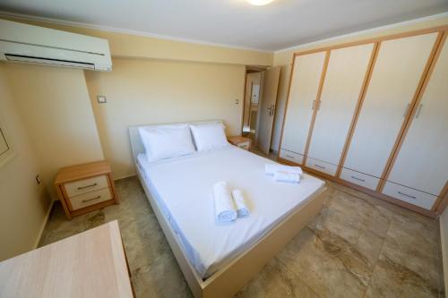 Postel nebo postele na pokoji v ubytování Schinias Paradise