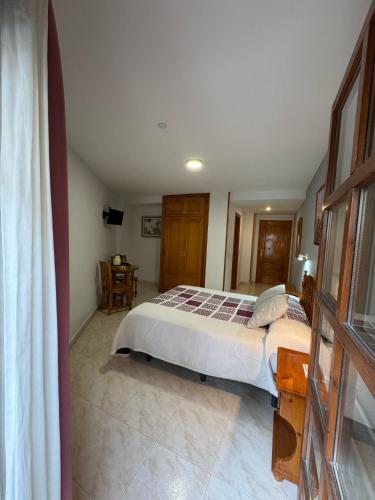 Hostal Marboréにあるベッド