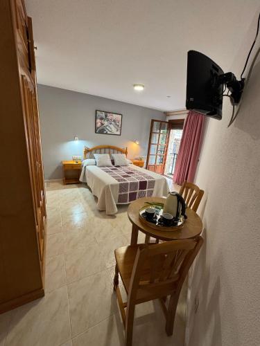 Hostal Marboréにあるベッド