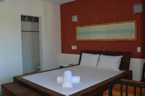 Ένα ή περισσότερα κρεβάτια σε δωμάτιο στο Hotel Cristal Mazunte